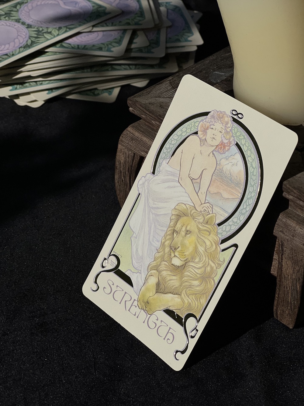 The Strength tarot card, symbolizing inner power and courage